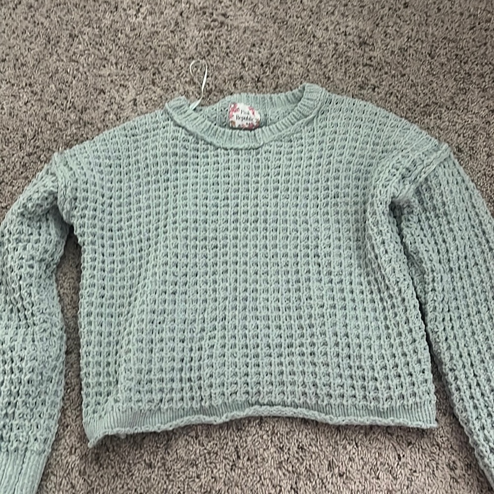 green sweater